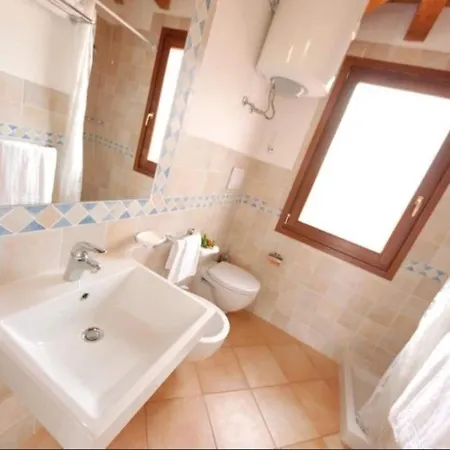 With Shared Pool, Aglientu Casa vacanze